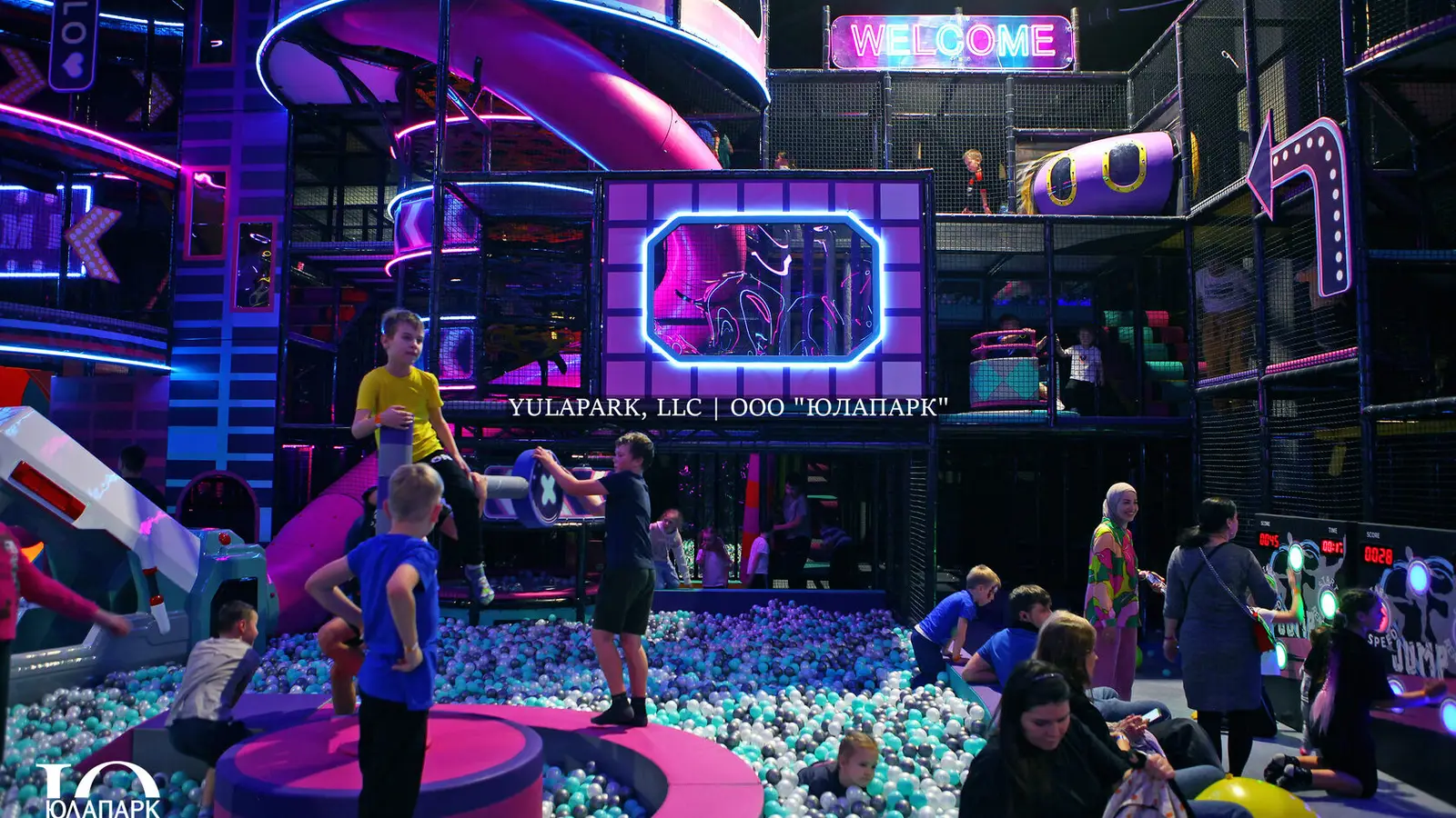 Family amusement park in Kaliningrad NEOPORT, a view of labyrinths, slides in the form of a dinosaur or a snake, balls in the city of the future.