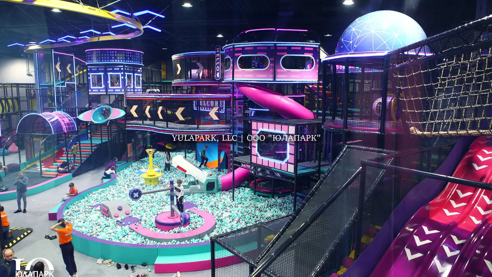 A family amusement park in Kaliningrad NEOPORT, a view from above of the skyrider, labyrinths, slides, balls and tubing in the city of the future.